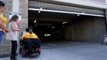 Tenants say strangers enter the building through a garage door that's been stuck open for months