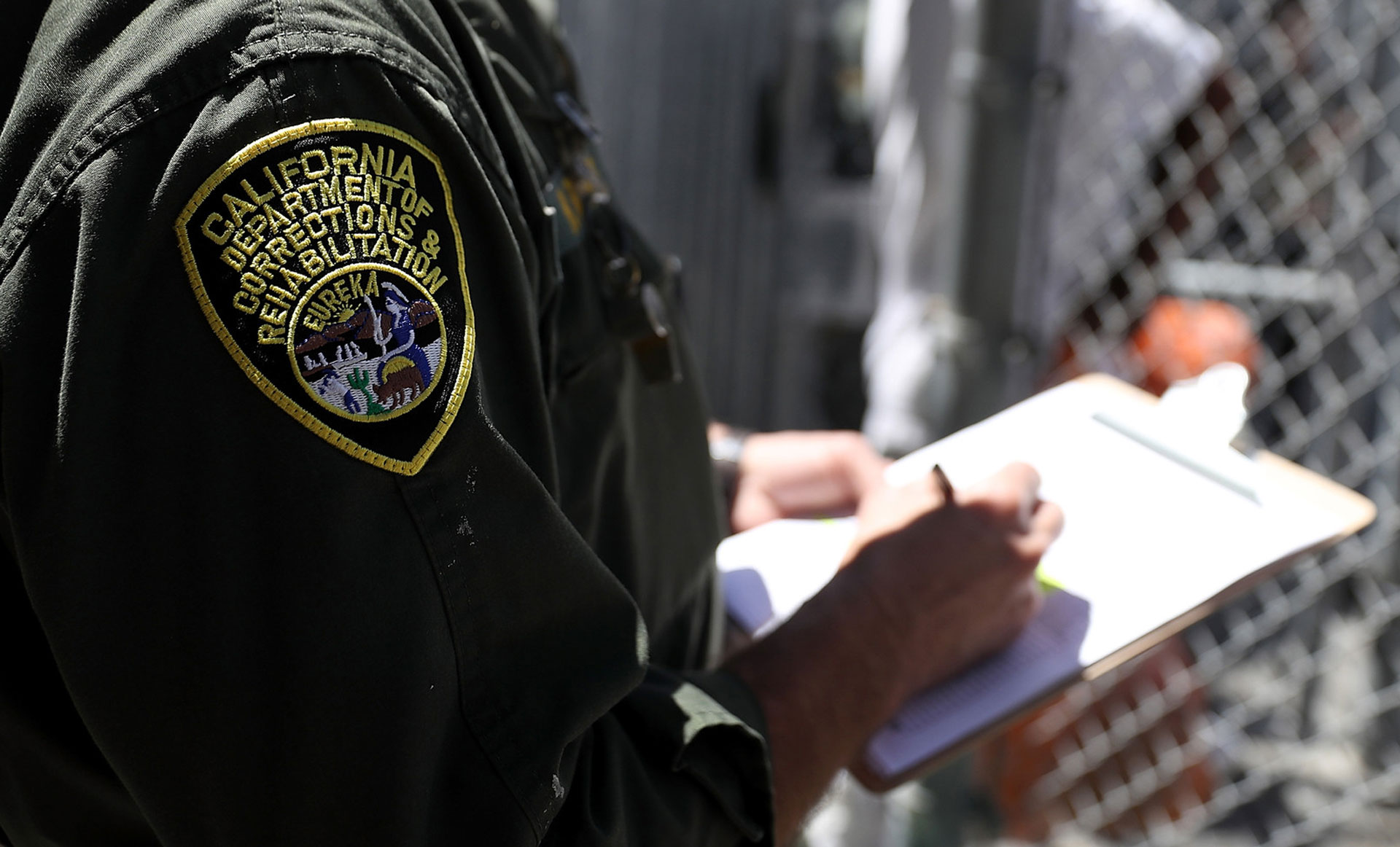 CDCR guard holds clipboard