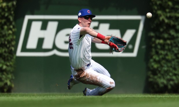 Cubs center fielder Pete Crow-Armstrong makes a sliding catch of a fly ball hit by Giants designated hitter Casey Schmitt in the sixth inning Saturday, June 6, 2026, at Wrigley Field. (Chris Sweda/Chicago Tribune)