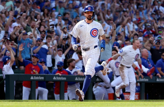 Cubs baserunner Dansby Swanson comes around to score the winning run after an error by the Giants in the 10th inning Saturday, June 6, 2026, at Wrigley Field. (Chris Sweda/Chicago Tribune)