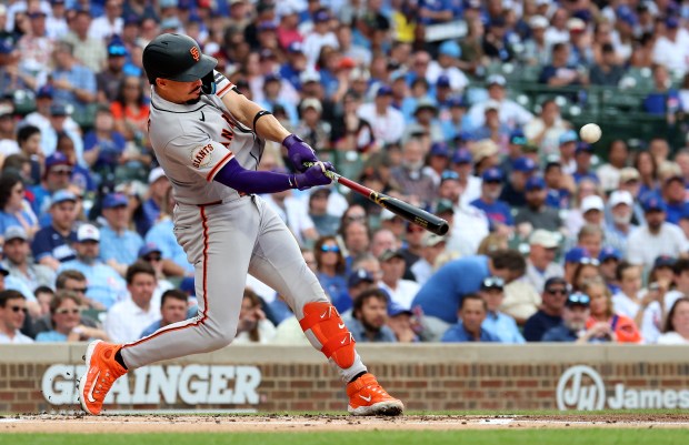 San Francisco Giants shortstop Willy Adames hits a two-run home run in the first inning of a game against the Chicago Cubs at Wrigley Field in Chicago on June 5, 2026. (Chris Sweda/Chicago Tribune)