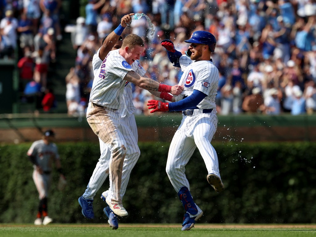 Photos: Chicago Cubs beat San Francisco Giants 3-2 in 10 innings