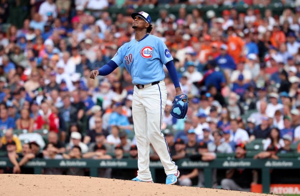 Chicago Cubs starting pitcher Edward Cabrera watch the flight of a two-run home run hit by San Francisco Giants left fielder Casey Schmitt in the fourth inning of a game at Wrigley Field in Chicago on June 5, 2026. (Chris Sweda/Chicago Tribune)