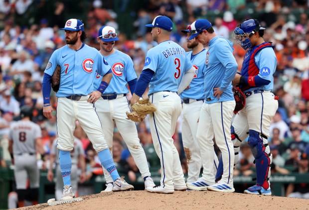 Chicago Cubs manager Craig Counsell stands on the mound with his team during a pitching change in the sixth inning of a game against the San Francisco Giants at Wrigley Field in Chicago on June 5, 2026. (Chris Sweda/Chicago Tribune)