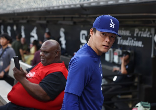 Dodgers pitcher Yoshinobu Yamamoto heads to the clubhouse before a game against the White Sox at Rate Field on June 12, 2026, in Chicago. (John J. Kim/Chicago Tribune)