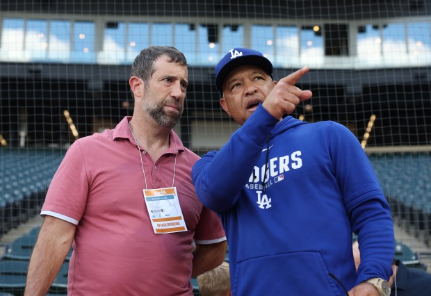 White Sox minority owner Justin Ishbia, left, and Dodgers manager Dave Roberts talk before a White Sox-Dodgers game at Rate Field on June 12, 2026, in Chicago. (John J. Kim/Chicago Tribune)