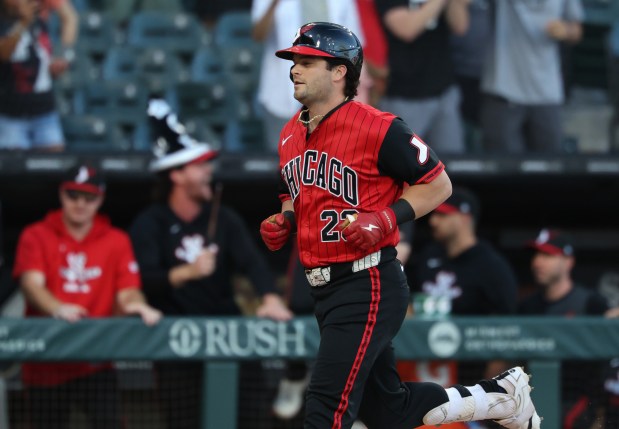 White Sox designated hitter Andrew Benintendi heads for home after hitting a home run in the first inning against the Dodgers at Rate Field on June 12, 2026, in Chicago. (John J. Kim/Chicago Tribune)