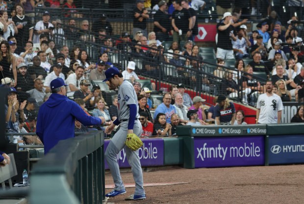 Dodgers starting pitcher Roki Sasaki heads to the dugout after being taken out of the game in the fifth inning against the White Sox on June 12, 2026, at Rate Field. (John J. Kim/Chicago Tribune)