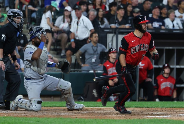White Sox center fielder Tristan Peters drops his bat after hitting a two-run triple in the fifth inning against the Dodgers on June 12, 2026, at Rate Field. (John J. Kim/Chicago Tribune)