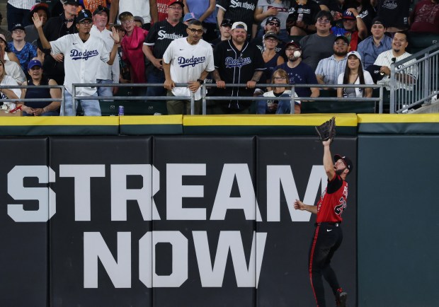 White Sox center fielder Tristan Peters catches a fly ball from Dodgers shortstop Miguel Rojas for an out in the ninth inning at Rate Field on June 12, 2026, in Chicago. (John J. Kim/Chicago Tribune)
