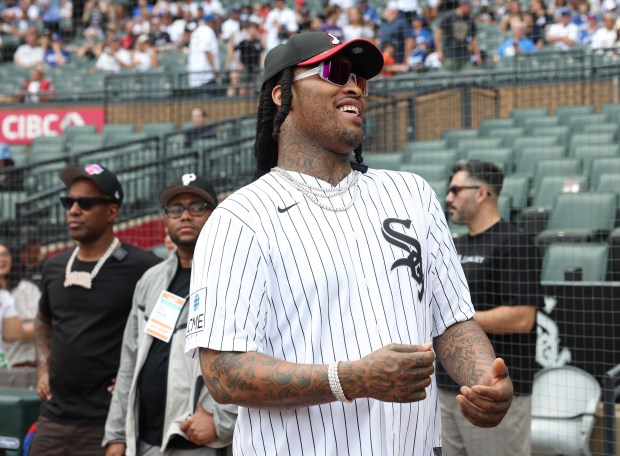 Rapper Waka Flocka Flame talks with fans before a White Sox-Dodgers game on June 13, 2026, at Rate Field. (John J. Kim/Chicago Tribune)