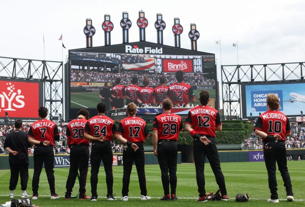 White Sox players stand for the national anthem before a game against the Dodgers on June 13, 2026, at Rate Field. (John J. Kim/Chicago Tribune)