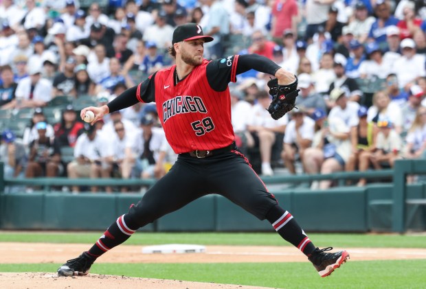 White Sox starter Sean Burke delivers against the Dodgers in the first inning on June 13, 2026, at Rate Field. (John J. Kim/Chicago Tribune)