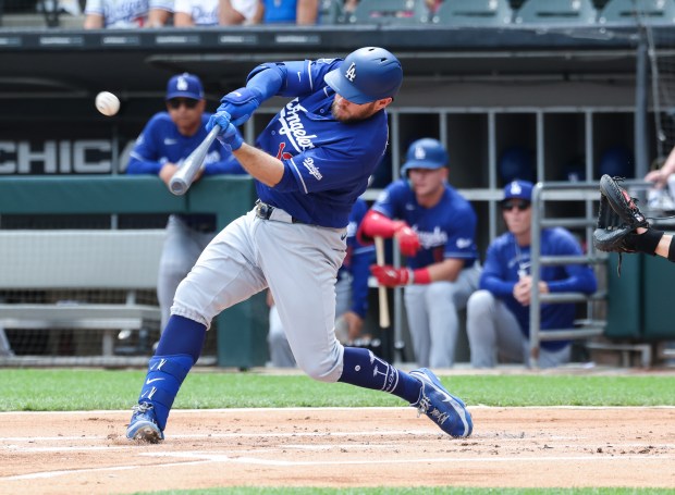 Dodgers third baseman Max Muncy connects for a two-run home run against the White Sox in the first inning on June 13, 2026, at Rate Field. (John J. Kim/Chicago Tribune)