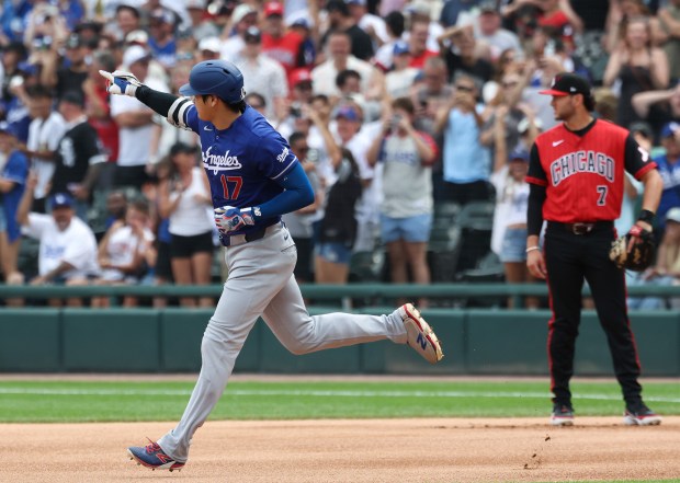 Dodgers designated hitter Shohei Ohtani rounds the bases after hitting a home run in the first inning against the White Sox on June 13, 2026, at Rate Field. (John J. Kim/Chicago Tribune)