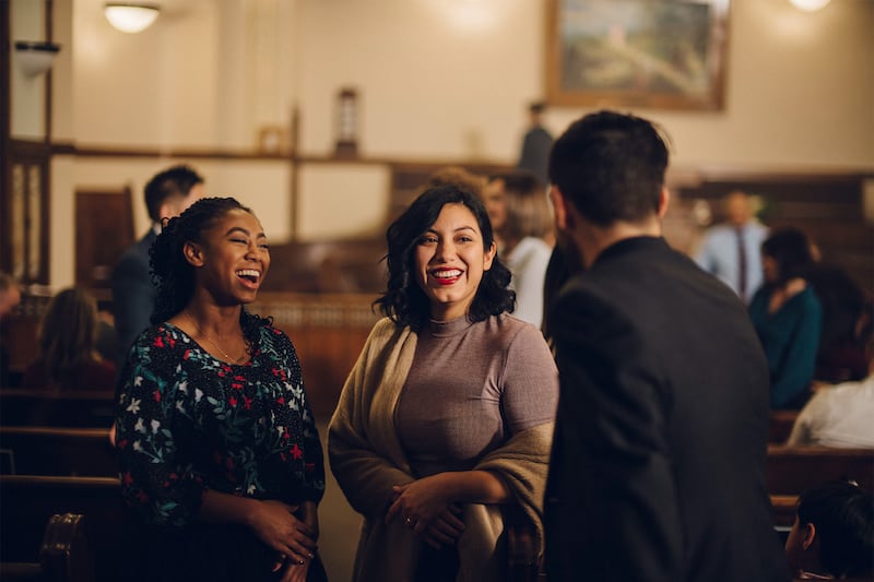 Members of a ward converse with each other.