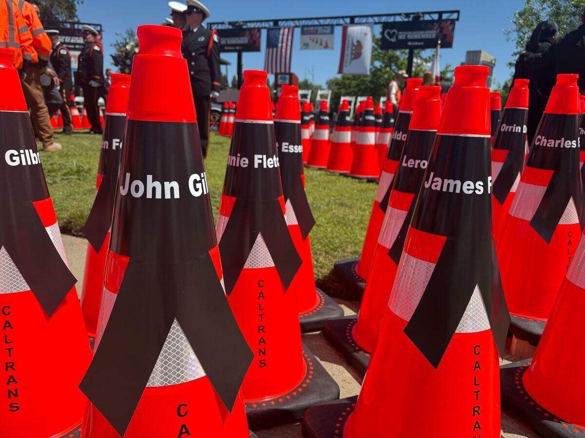 These 135 traffic cones were placed in a diamond shape in the middle of the Caltrans’ 36th annual workers memorial event in April 2026. Each cone represents a California highway maintenance and construction worker that has died on the job since 1921 — when the first death was recorded.
