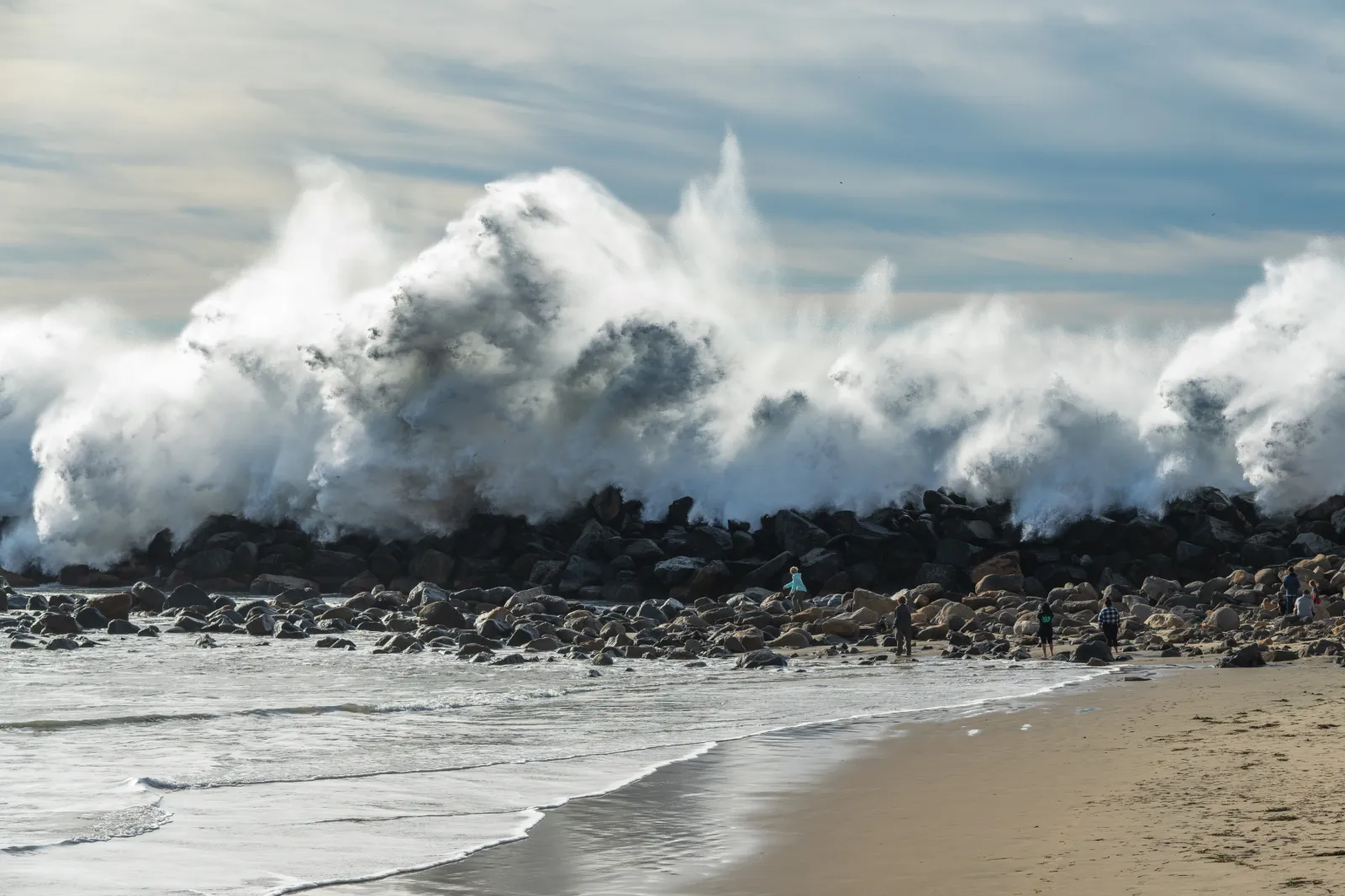 File photo: Powerful waves smash into rocks at Morro Bay in California in 2021.