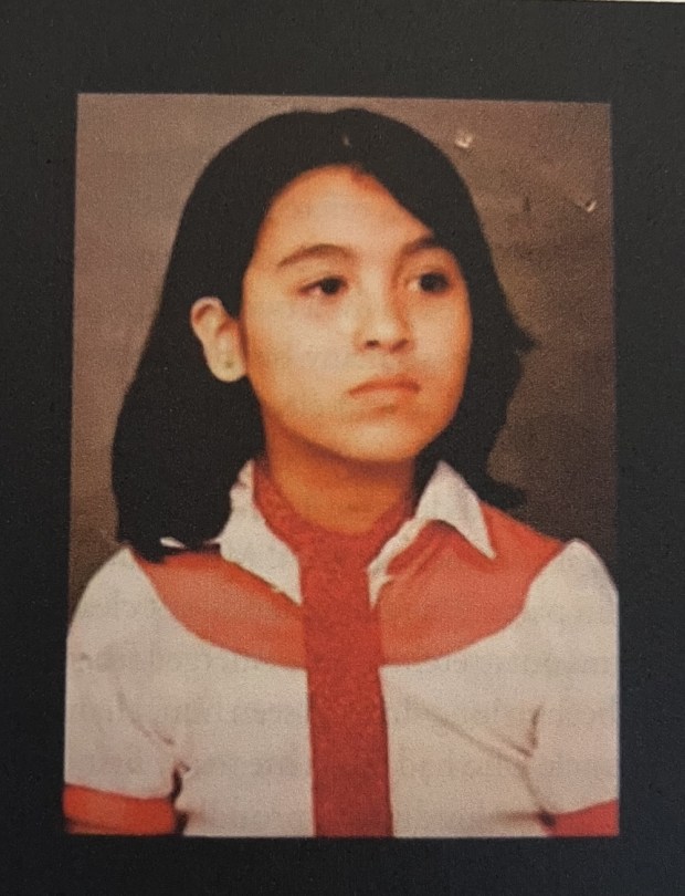 Masuda Rahmati's first passport photo when she came to America from Afghanistan. (Courtesy Masuda Rahmati)