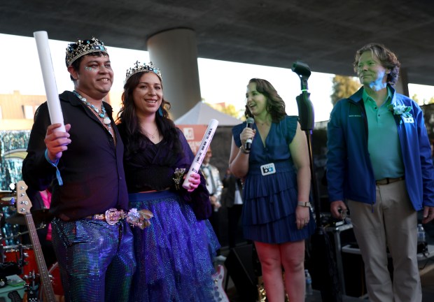 Porfirio Rangel and Mary Reyes, of Oakland, are crowned King and Queen of the prom by BART General Manager Bob Powers and Chief Communications Officer Alicia Trost during the BART Prom at the Rockridge BART station Oakland, Calif., on Saturday, June 6, 2026. The first-ever event had an 1980's and under-the-sea theme and sold out. (Jane Tyska/Bay Area News Group)
