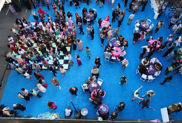 People dance to tunes by D.J. Billy Vidal during the BART Prom at the Rockridge BART station Oakland, Calif., on Saturday, June 6, 2026. The first-ever event had an 1980's and under-the-sea theme and sold out. (Jane Tyska/Bay Area News Group)