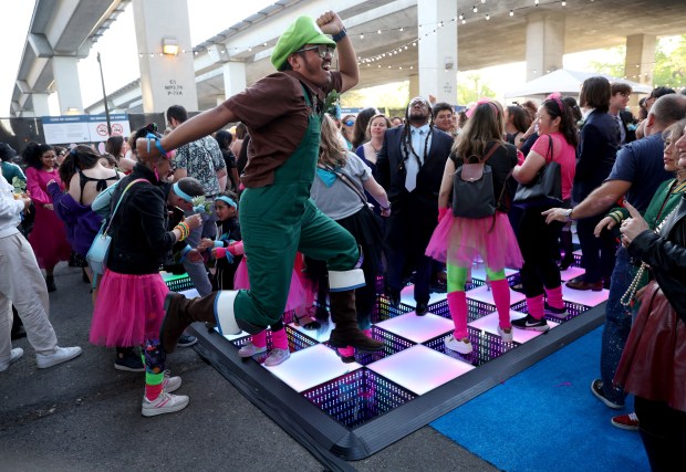 Marcel Gaite, of Brentwood, dances during the BART Prom at the Rockridge BART station Oakland, Calif., on Saturday, June 6, 2026. The first-ever event had an 1980's and under-the-sea theme and sold out. (Jane Tyska/Bay Area News Group)