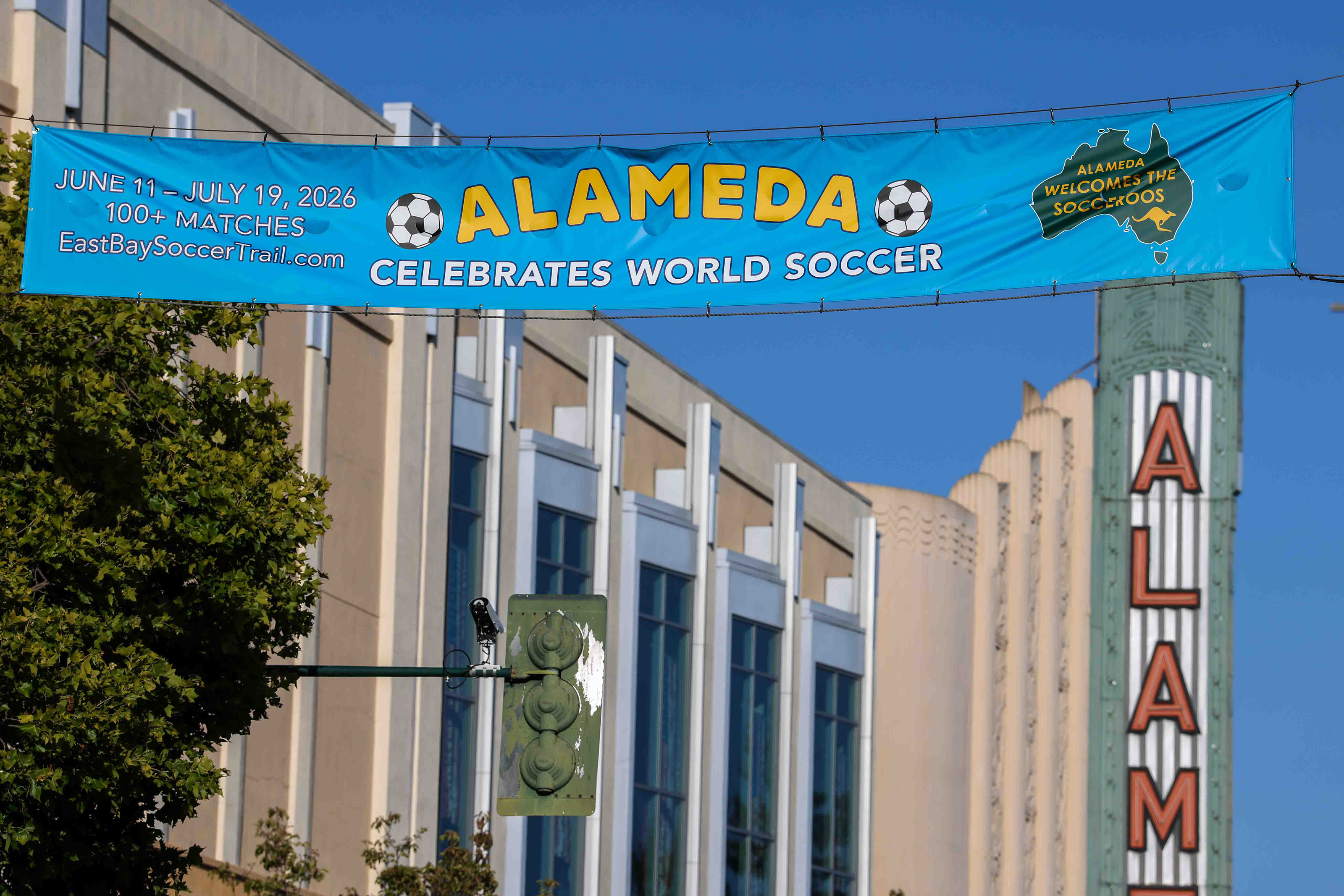 Banners and flags welcoming the Australian national soccer team, the...