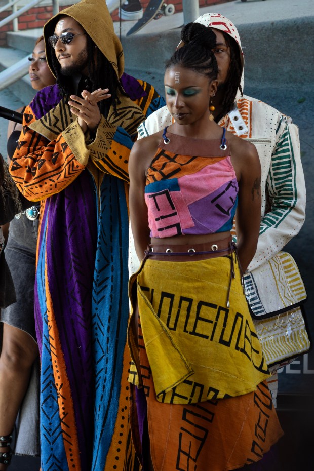 Models wearing clothing from DA+AF wait to walk the runway during a Bay Area Black Fashion Expo show to celebrate Juneteenth, Friday, June 19, 2026 in Emeryville, Calif. (D. Ross Cameron for the Bay Area News Group)
