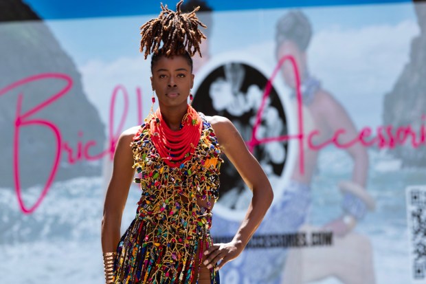 A model wearing a design from Brick House Accessories walks the runway during a Bay Area Black Fashion Expo show to celebrate Juneteenth, Friday, June 19, 2026 in Emeryville, Calif. (D. Ross Cameron for the Bay Area News Group)