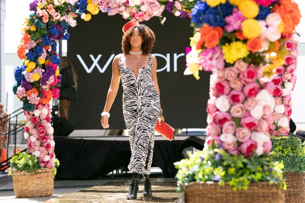 A model wearing an outfit from Nikki Designs walks the runway during a Bay Area Black Fashion Expo show to celebrate Juneteenth, Friday, June 19, 2026 in Emeryville, Calif. (D. Ross Cameron for the Bay Area News Group)