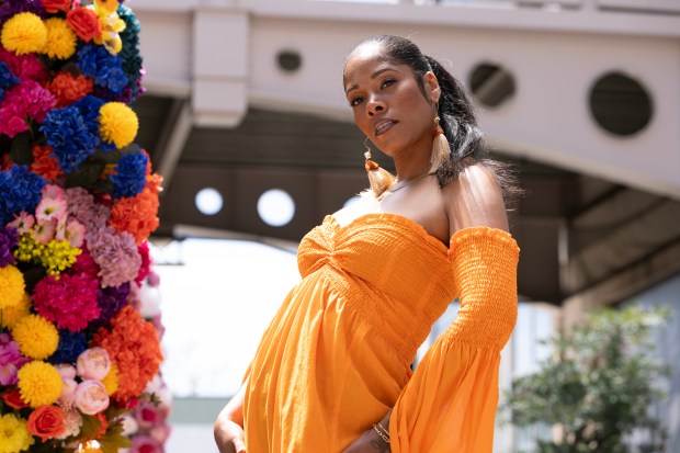 A model wearing an outfit from Nikki Designs walks the runway during a Bay Area Black Fashion Expo show to celebrate Juneteenth, Friday, June 19, 2026 in Emeryville, Calif. (D. Ross Cameron for the Bay Area News Group)