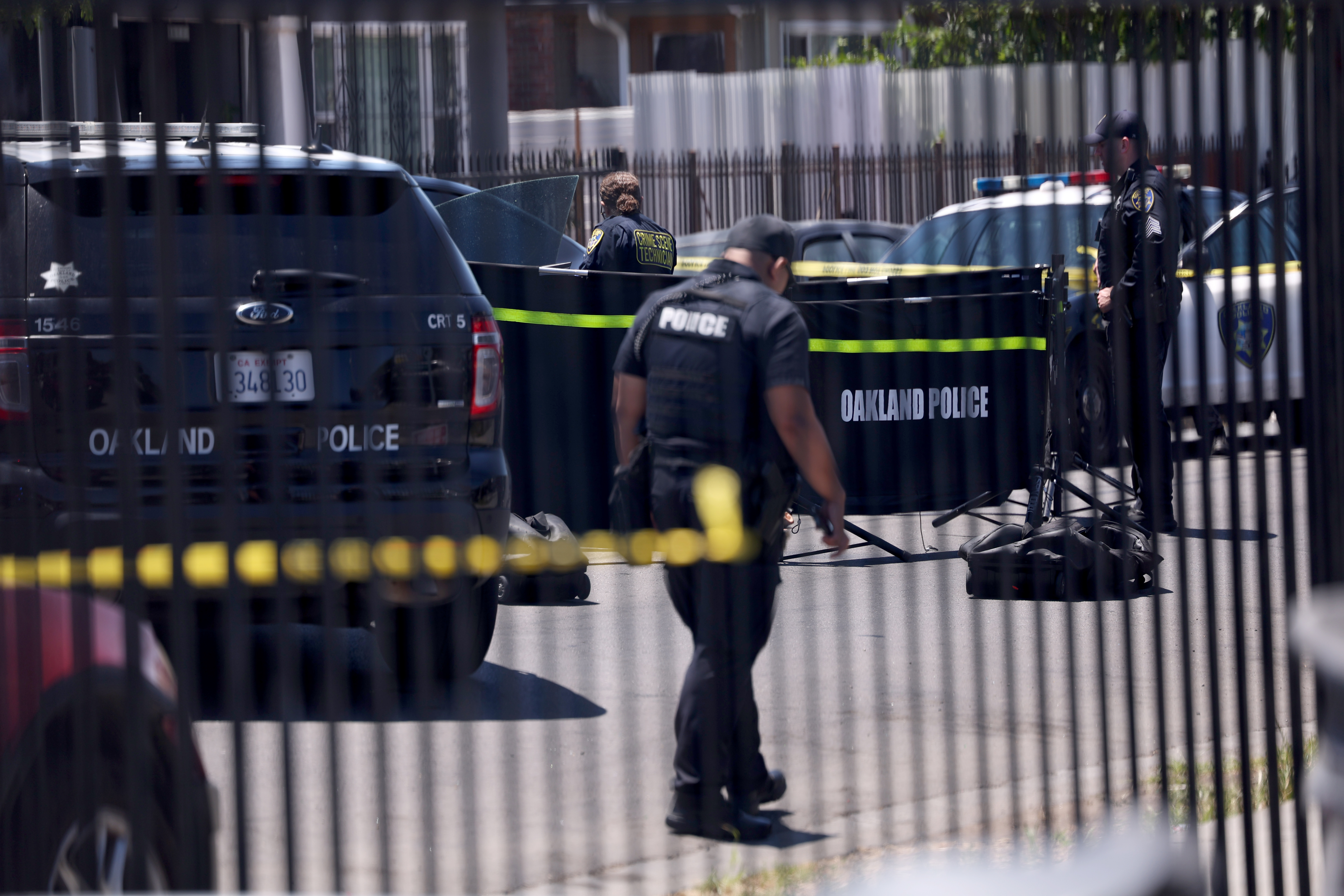 Oakland police investigate a fatal shooting on Seminary Avenue and...