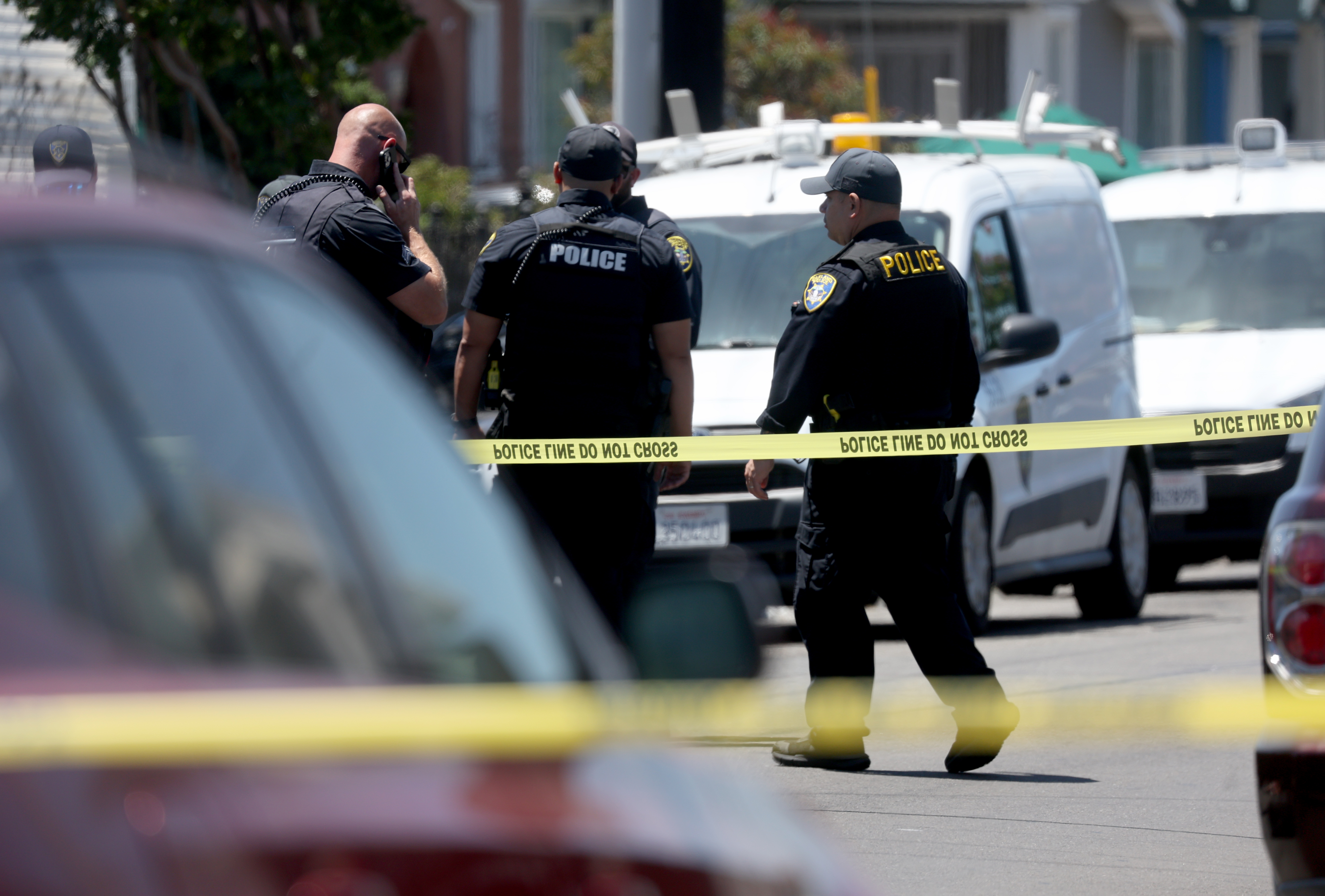 Oakland police investigate a fatal shooting on Seminary Avenue and...