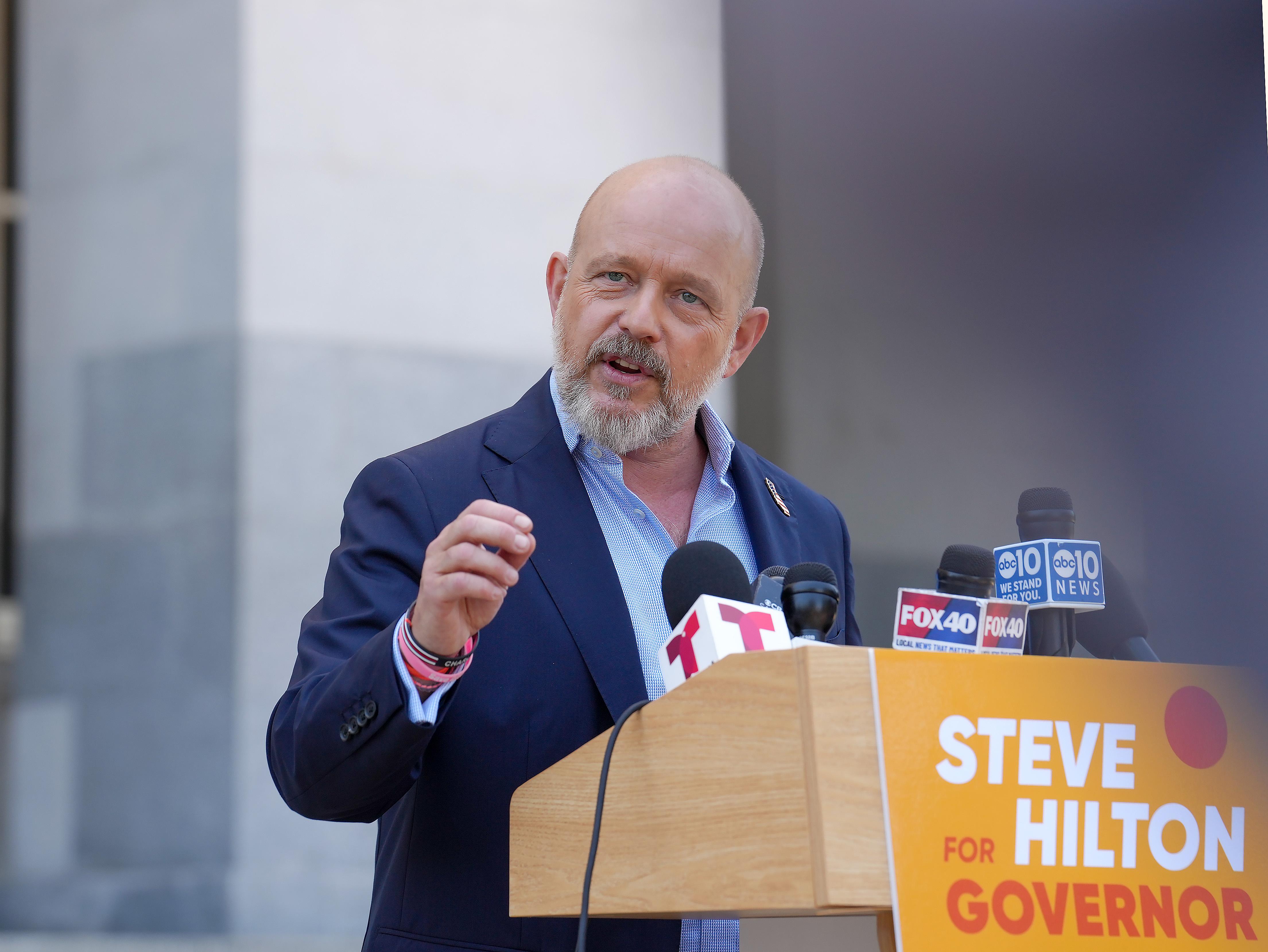 California Republican gubernatorial candidate Steve Hilton speaks to reporters outside...