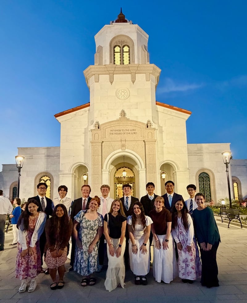Young men and young women who served on the youth coordinating council for the Yorba Linda California Temple open house pose for a photo outside the temple in Yorba Linda, California, on Saturday, May 2, 2026.