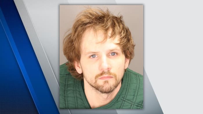 Oakland County man accused of attacking his mom, pointing gun at mother of his children