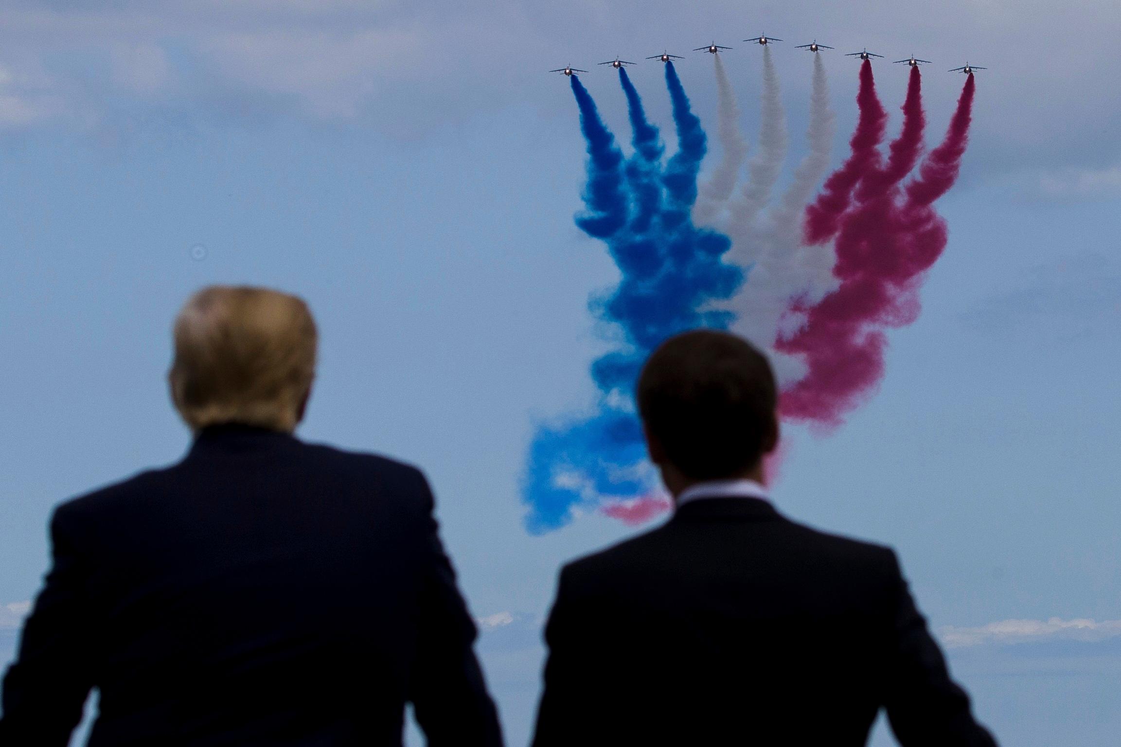 FILE – President Donald Trump, left, and French President Emmanuel...