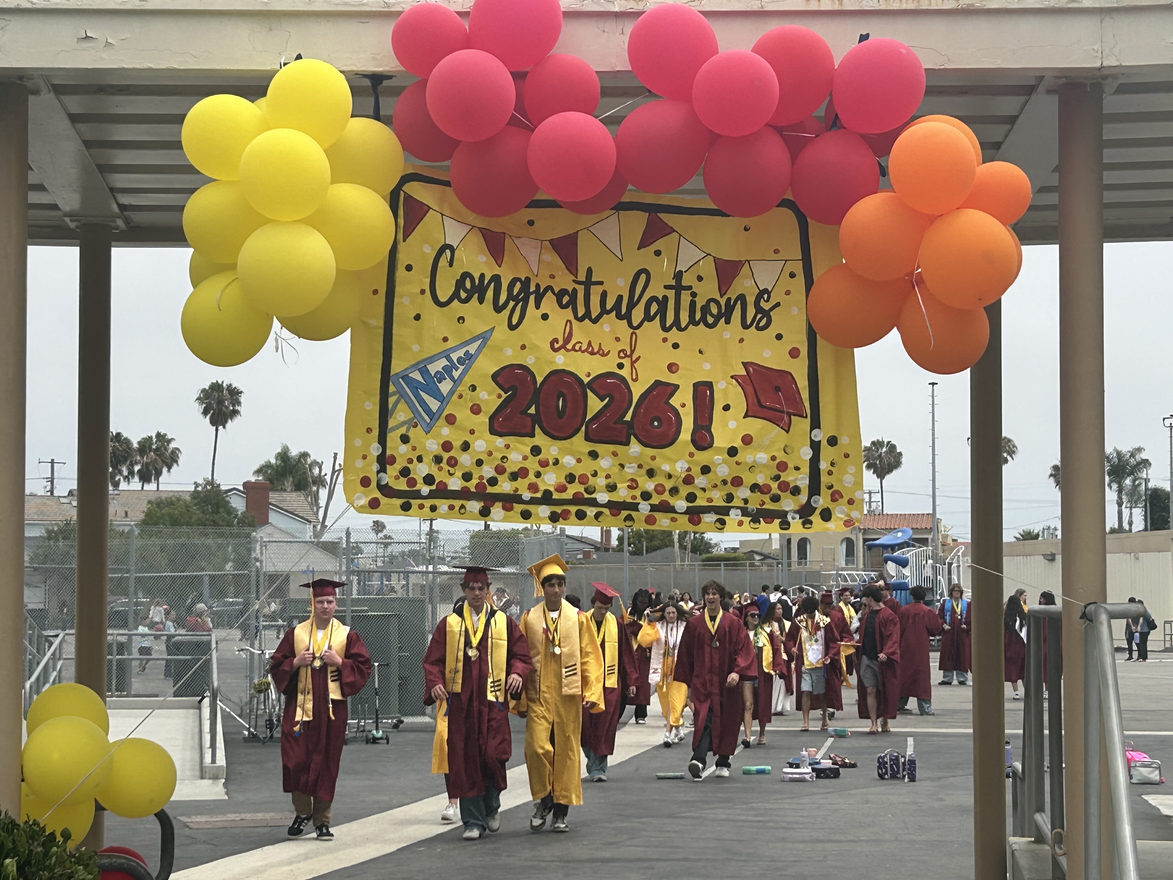 Graduating seniors from the Class of 2026 return to their...