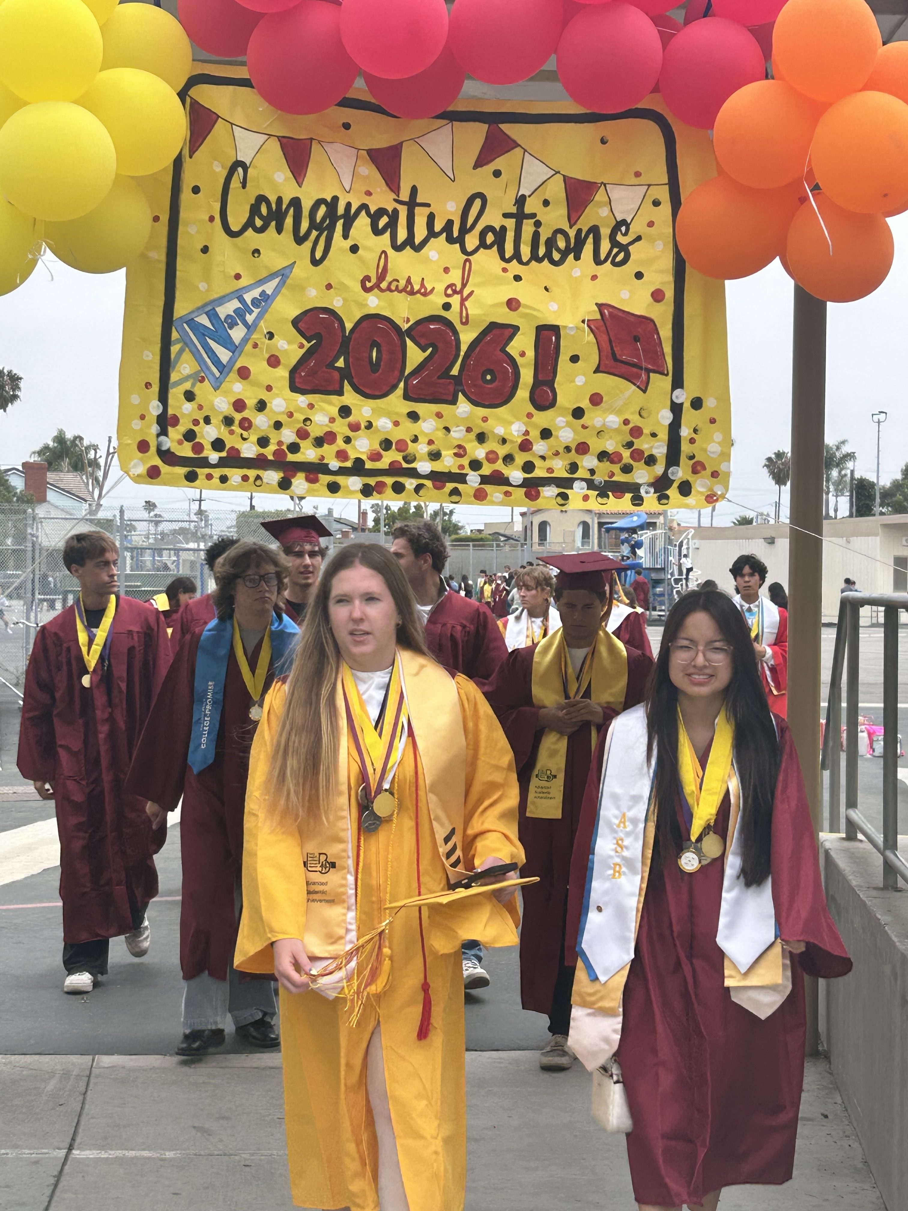 Graduating seniors from the Class of 2026 return to their...