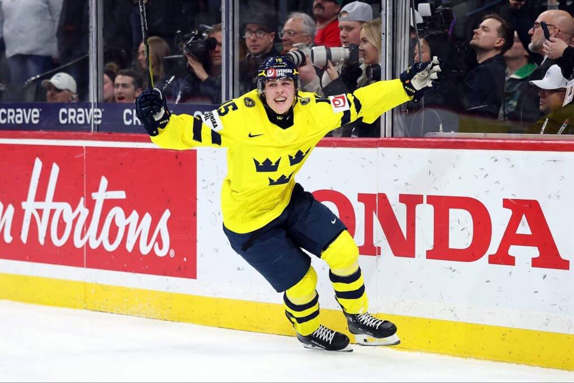 Ivar Stenberg of Sweden celebrates a goal in the gold-medal game of the World Junior Hockey Championship on Jan. 5, 2026.