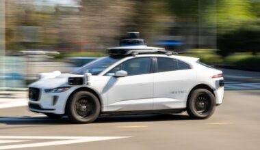 A Waymo autonomous taxi outside the Google headquarters
