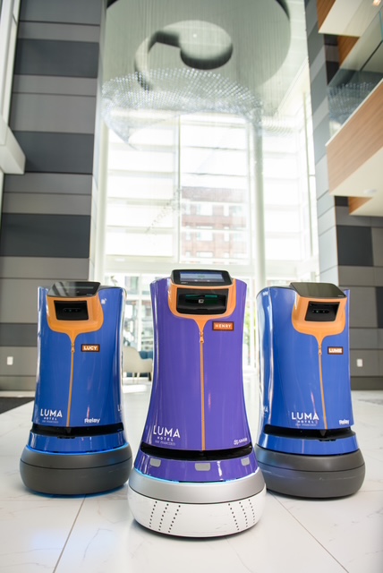 Scan a QR code to order breakfast, and a robot butler delivers it to your door at Luma Hotel in San Francisco's Mission Bay district. Above, Luma Hotel robots stand at the ready. (photo courtesy of the Luma Hotel)