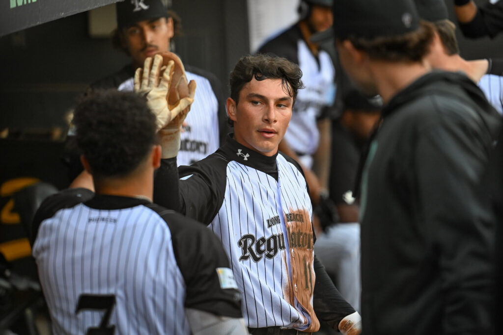 In Photos: Warren G pitches the regulators' first opening night with a 6-3 win