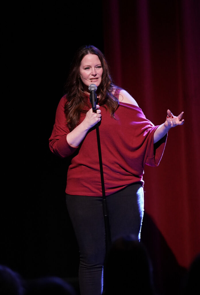 HollyShaw photo by Patrick Rutherford IMG_6781 Holly Shaw shares a humorous moment during her acclaimed solo show Roar! at the Hollywood Fringe Festival.