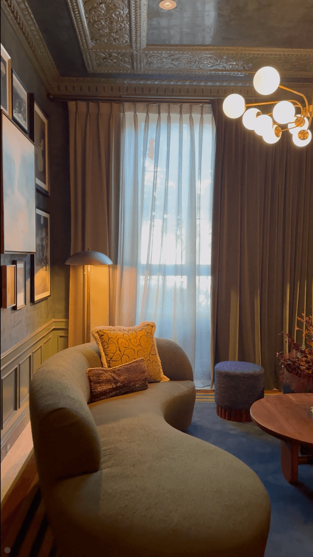 Image may contain Indoors Interior Design Architecture Building Furniture Living Room Room Home Decor and Couch