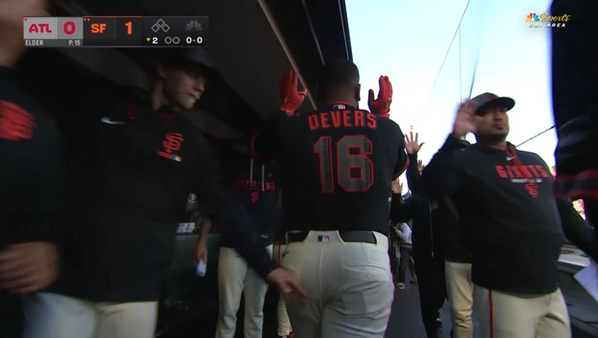 Rookie Jonah Cox reaching out to touch the cloak