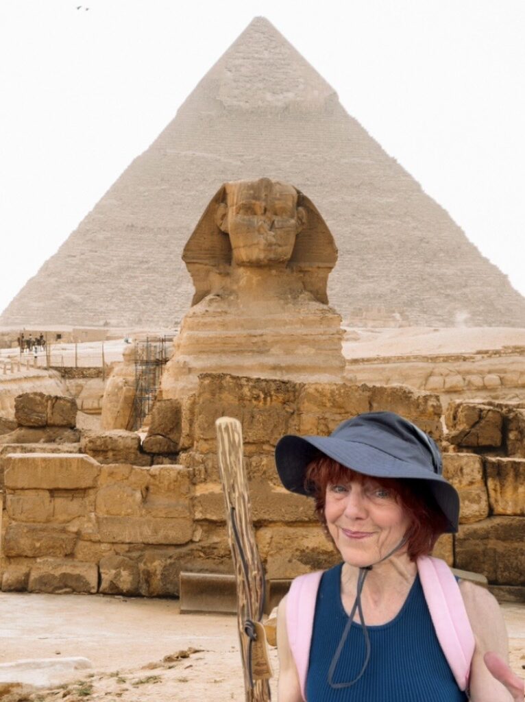 Jacqi Bowe standing in front of the Great Sphinx and Pyramid of Giza for Hashtag What I Did on My Summer Fake-Cation