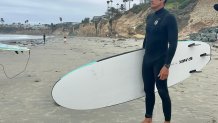 Roberto Baquerizo is a professional surf coach with experience in surviving life-threatneing rip currents. Sunday, he checked out swells at Tourmaline Surf Park where he offered lessons, Pacific Beach, Calif., June 14, 2026.