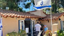The House of Israel has a security guard at the door, providing volunteers with extra protection, June 21, 2026.