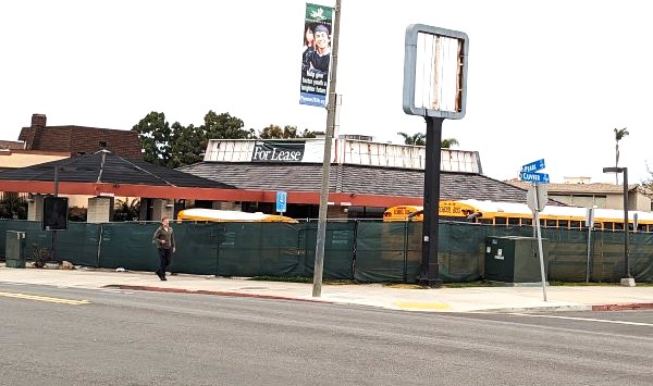 The former Jack in the Box property on Pearl Street owned by The Bishop's School is currently used for school bus parking. (Ashley Mackin-Solomon)